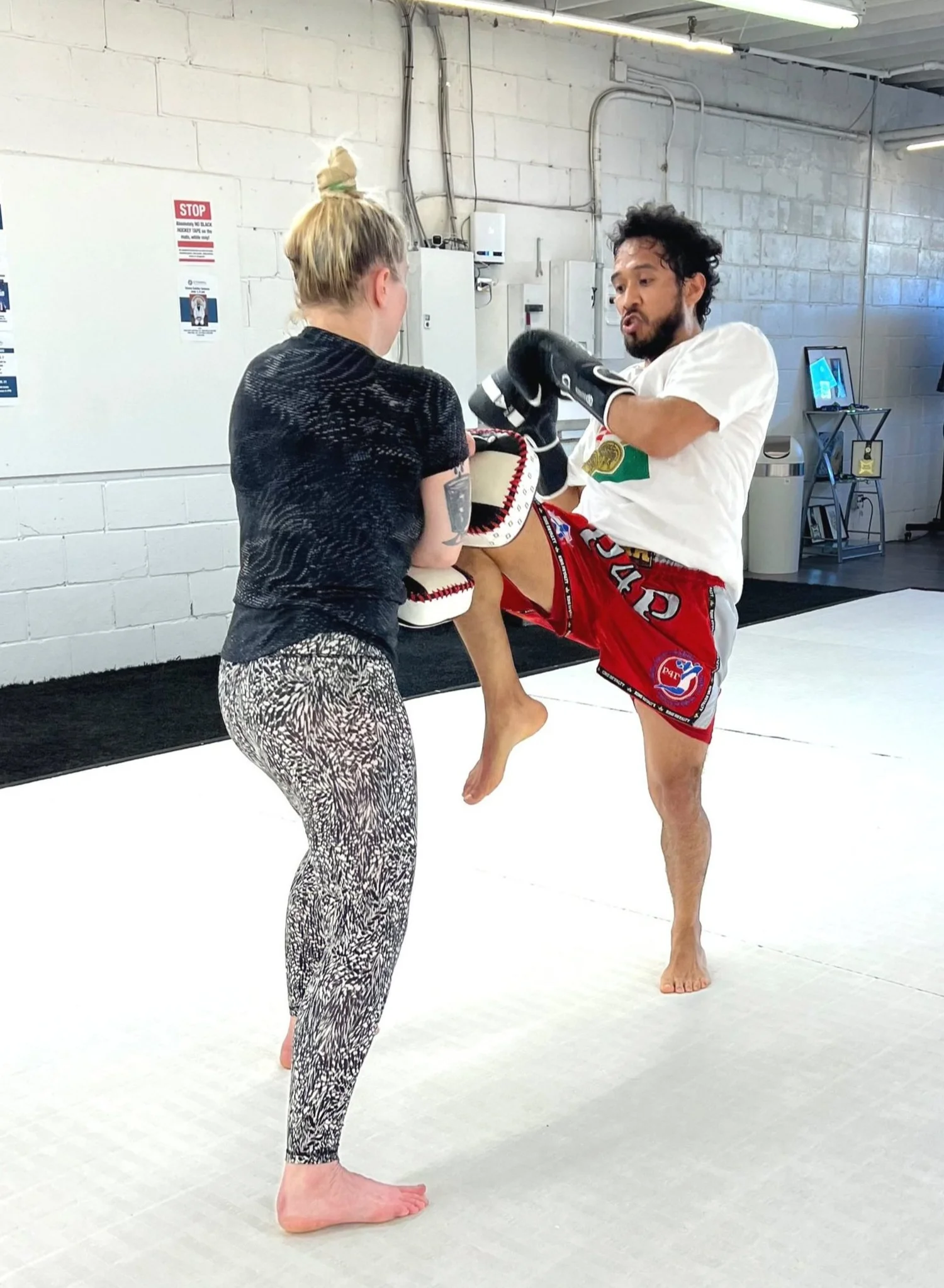 Muay Thai pad work at Ethereal BJJ Academy